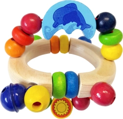 Drewniana grzechotka z delfinem