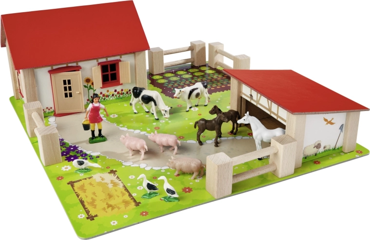 Stabilne drewniane budynki z czerwoną dachówką