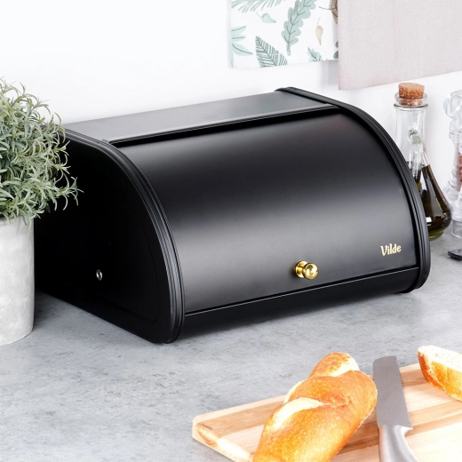 Wygodna roletowa pokrywa ze złotym uchwytem