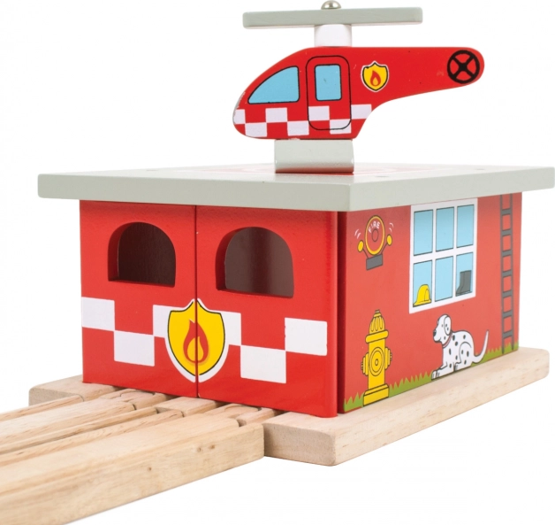 Drewniana stacja strażacka z lądowiskiem dla helikoptera Bigjigs Rail