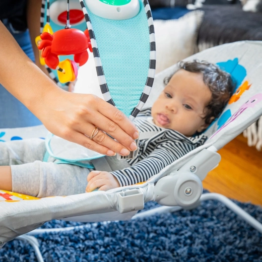 Odpinany pałąk z wiszącymi zabawkami