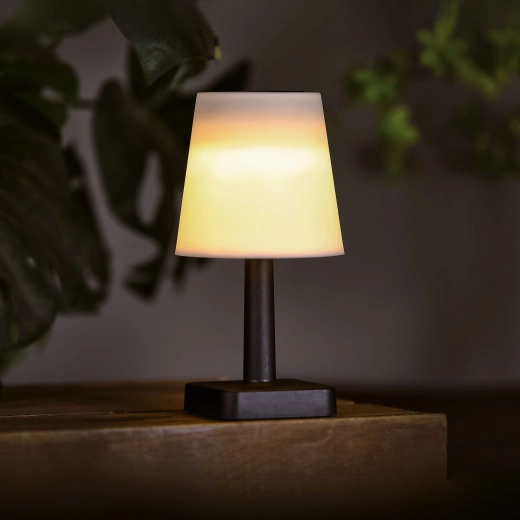 Biała solarna lampa stołowa z ciepłym białym światłem LED