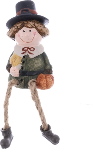 Ceramiczna figurka chłopca z materiałowymi nóżkami