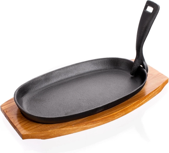 Żeliwna owalna patelnia 23 × 14 cm z drewnianą deską GRADA