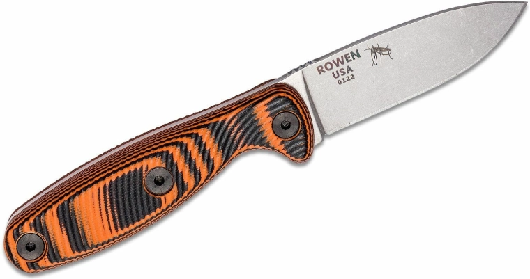 Pewny chwyt dzięki G10 w czarno‑pomarańczowym kolorze