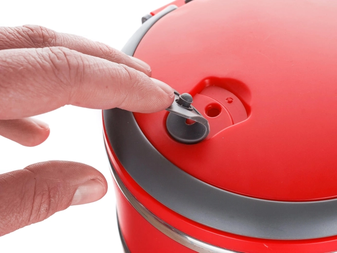 Pokrywka uszczelniająca z zaworem do bezpiecznego otwierania