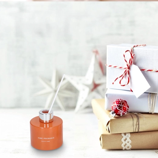 Elegancki dyfuzor w pomarańczowym szkle