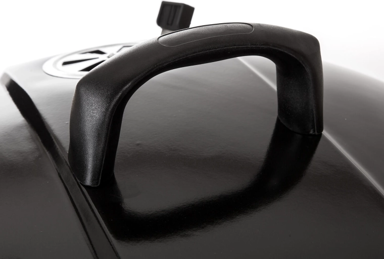 Pokrywa z regulacją dopływu powietrza i bezpiecznym uchwytem