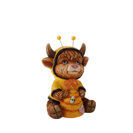 Ozdobna figurka krówki z ulem – dekoracja ogrodowa