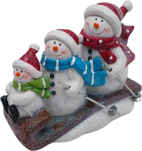 Dekoracja rodzinka bałwanków na sankach
