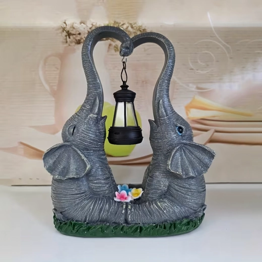 Solarny ogrodowy lampion – figurka słoni z latarenką LED