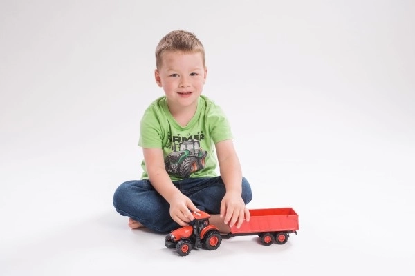 Czerwony traktor Zetor z przyczepą z efektami dźwiękowymi i świetlnymi - 36 cm