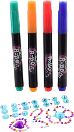 Kolorowe pisaki i błyszczące kryształki