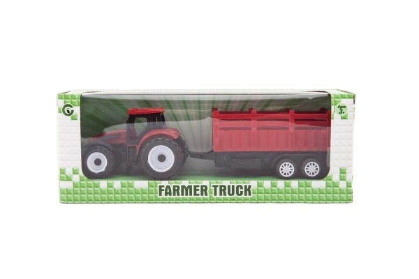 Traktor z przyczepą plastikowy 21cm na wolny bieg 2 kolory w pudełku 23x9x6cm