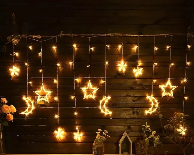 Zasłona LED ciepła biała z gwiazdami i księżycami - 2,5 m, 138 LED
