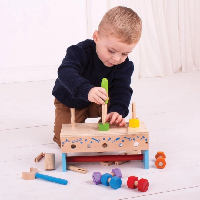 Drewniany stolik warsztatowy i skrzynka na narzędzia 2w1 Bigjigs Toys