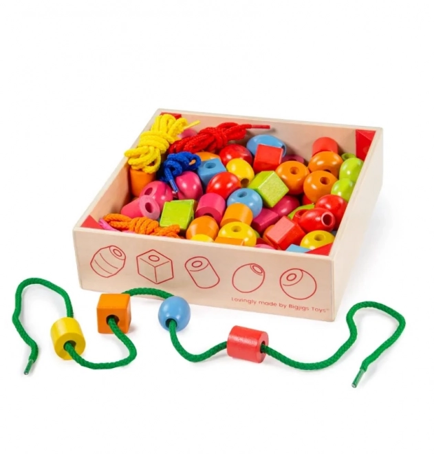 Bigjigs Toys Drewniane nawlekane koraliki w pojemniku