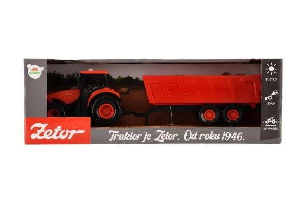 Czerwony traktor Zetor z przyczepą z efektami dźwiękowymi i świetlnymi - 36 cm