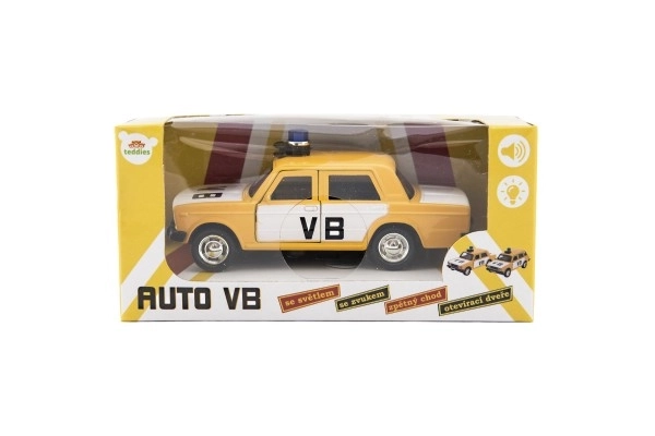 Samochód policyjny VB metal/plastik 12cm na naciąg w tył na baterie ze światłem i dźwiękiem w pudełku 15x7x7cm
