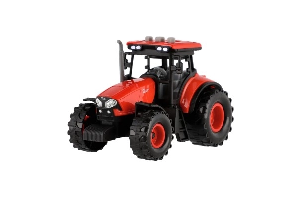 Czerwony traktor Zetor z przyczepą z efektami dźwiękowymi i świetlnymi - 36 cm