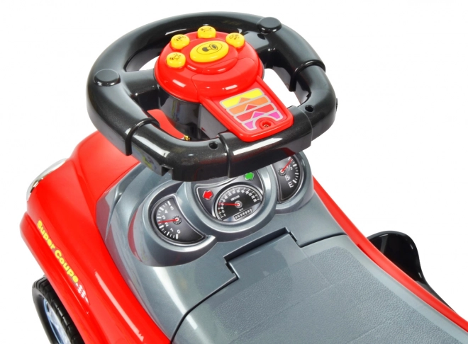 ECOTOYS Jeździk z dźwiękami i prowadnikiem Auto czerwone