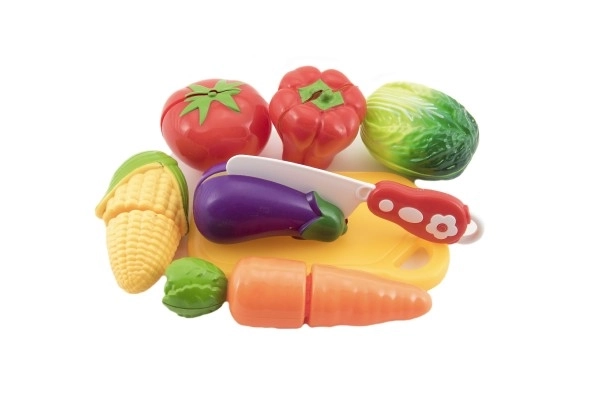 Plast do krojenia warzyw z deską 13,5x8cm z nożem w torebce 18x26x5cm