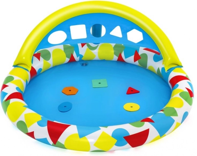 Nauka przez zabawę: sorter kształtów w daszku