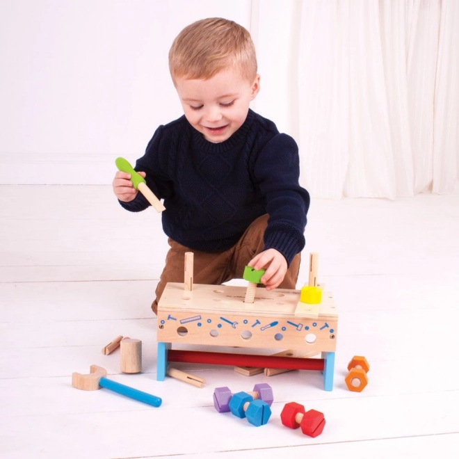 Drewniany stolik warsztatowy i skrzynka na narzędzia 2w1 Bigjigs Toys