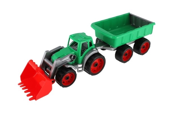 Traktor/ładowarka/koparka z przyczepą z plastikową łyżką na wolnym biegu 2 kolory w siatce 16x61x16cm