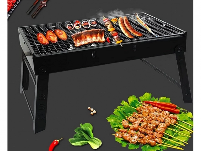 Przenośny składany grill na węgiel drzewny na kemping i BBQ